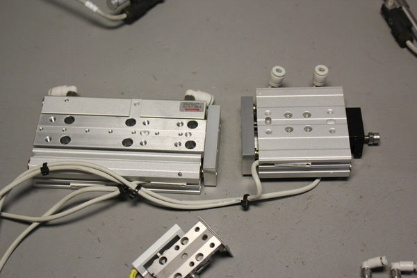 LOT OF 7 REXROTH & SMC PNEUMATIC CYLINDERS/SLIDES